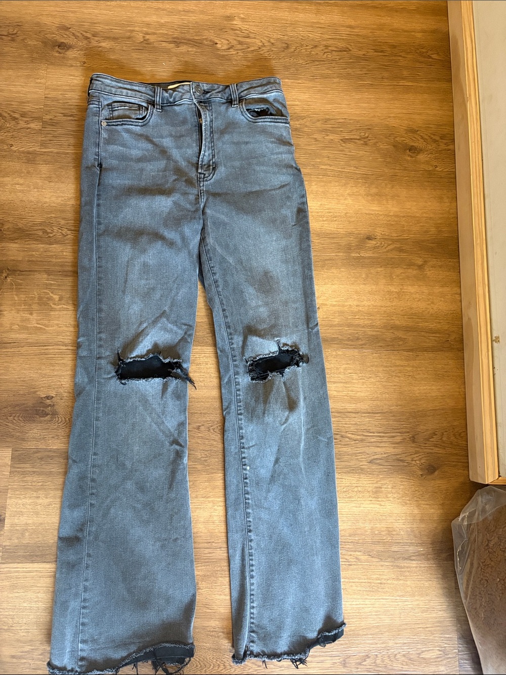 High-Rise Gray Distressed Flare Jeans with Knee Rips